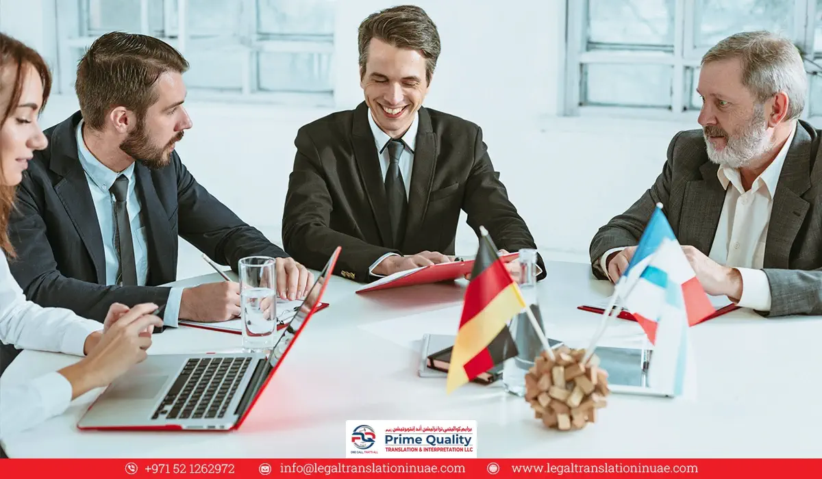 Professionals sit around a table, discussing translation services with international flags representing global collaboration.